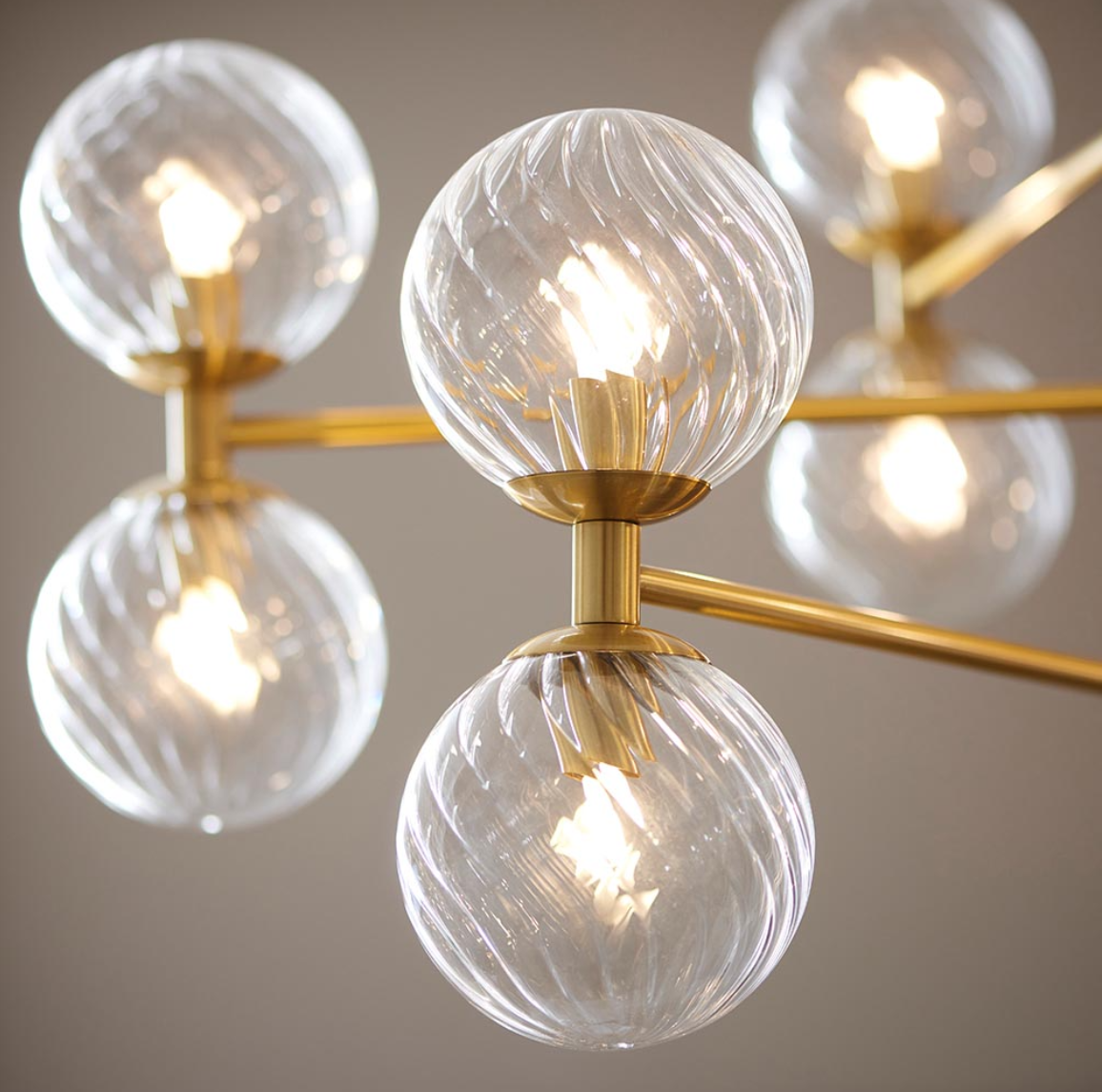 Vesilo Lighting Awry Aged Brass 12 Light Twisted Clear Glass Pendant