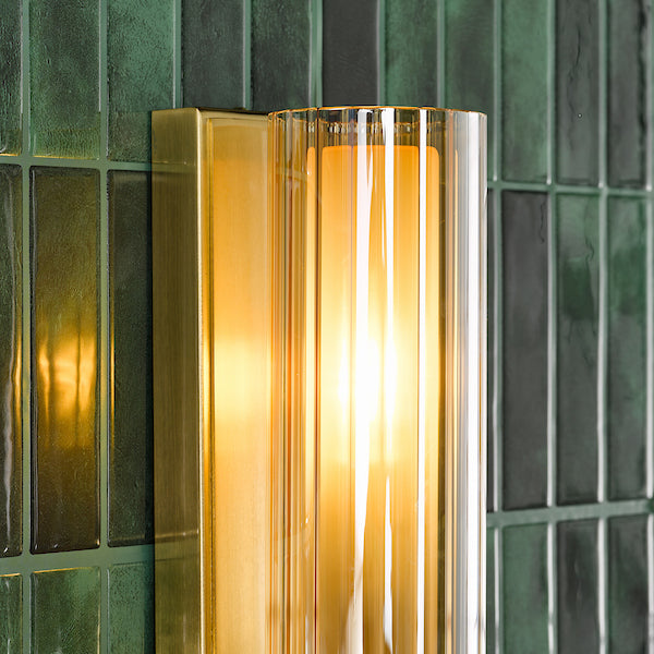 Dar Lighting Bevin Bathroom IP44 Natural Brass & Amber Ribbed Glass Wall Light