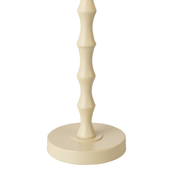 Cream table lamp stem and base on a white background