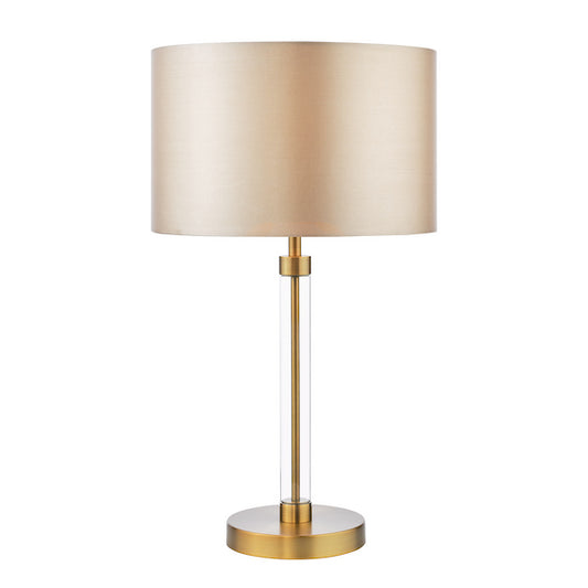Dar lighting table lamp with beige shade and gold base on a white background