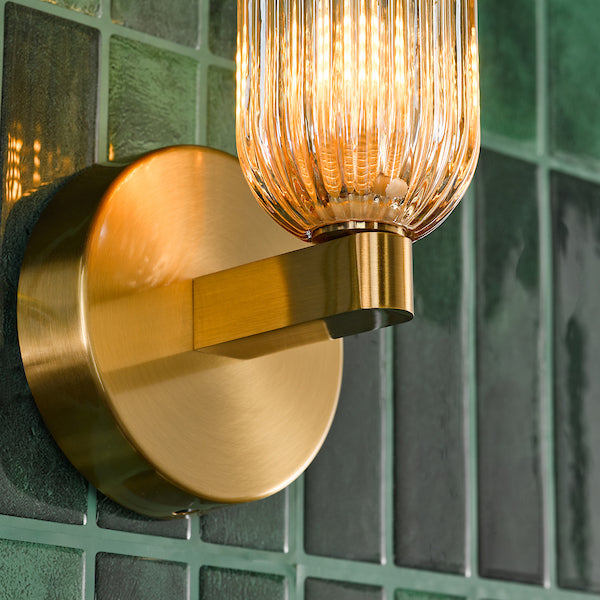 Dar Lighting Hilaria Bathroom IP44 Antique Gold & Amber Ribbed Glass Wall Light