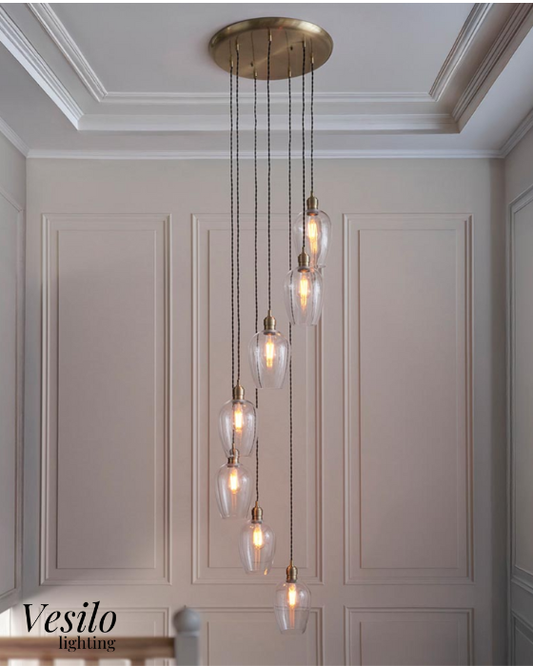 Vesilo Lighting Ares 7 Light Antique Brass & Clear Glass Cascade Pendant