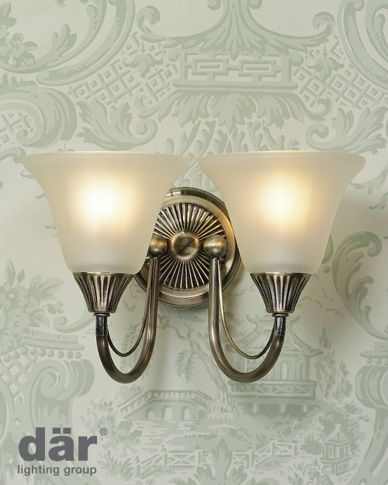 Two-light wall sconce with glass shades on a decorative wall background, featuring the dar lighting group logo.
