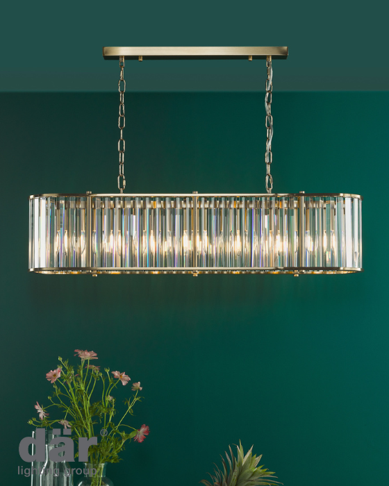 Chandelier with a green background and dar lighting branding.