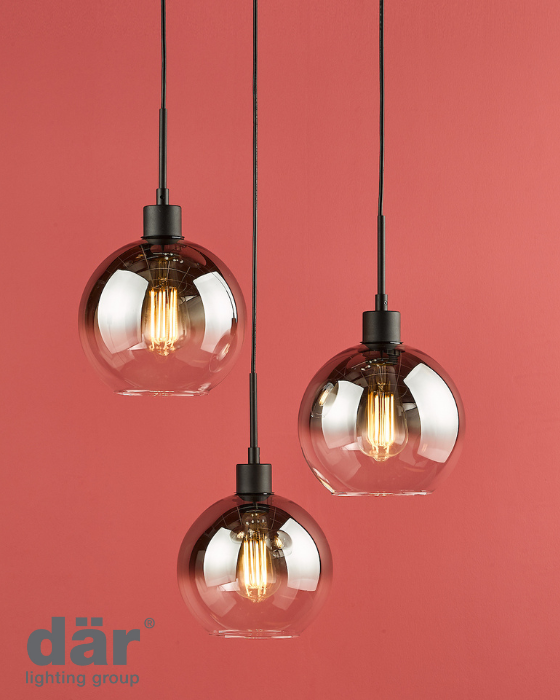Three hanging pendant lights with glass shades on a red background, featuring the dar lighting group logo.