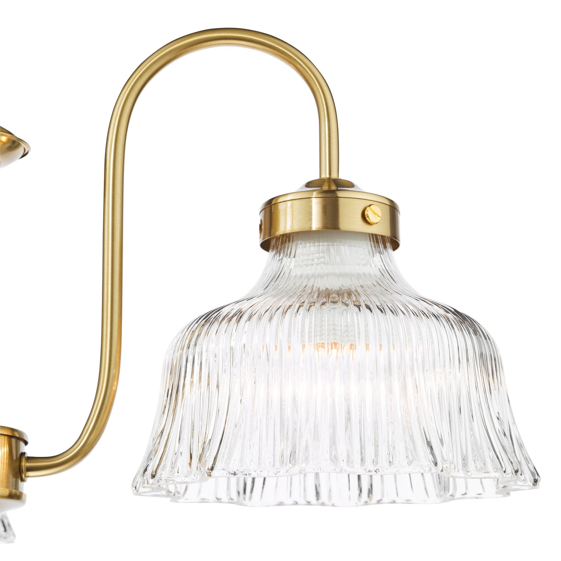 Wall-mounted dar lighting light fixture with gold arm and clear glass shade on a white background