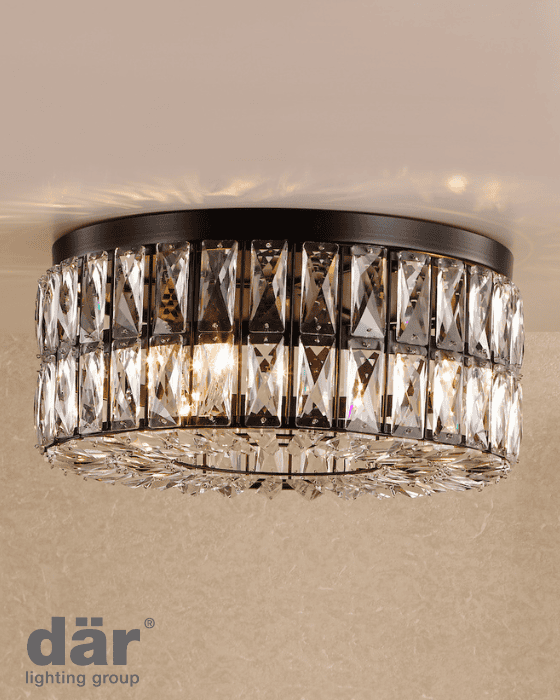 Decorative dar lighting ceiling light fixture with crystal accents on a beige wall.