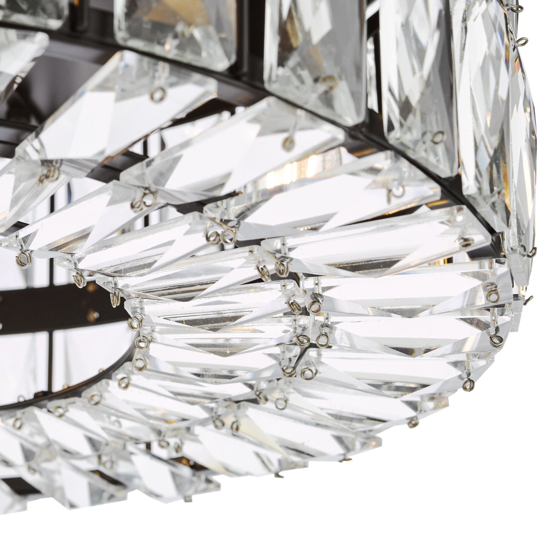Close-up of a dar lighting crystal chandelier with clear and white glass elements.
