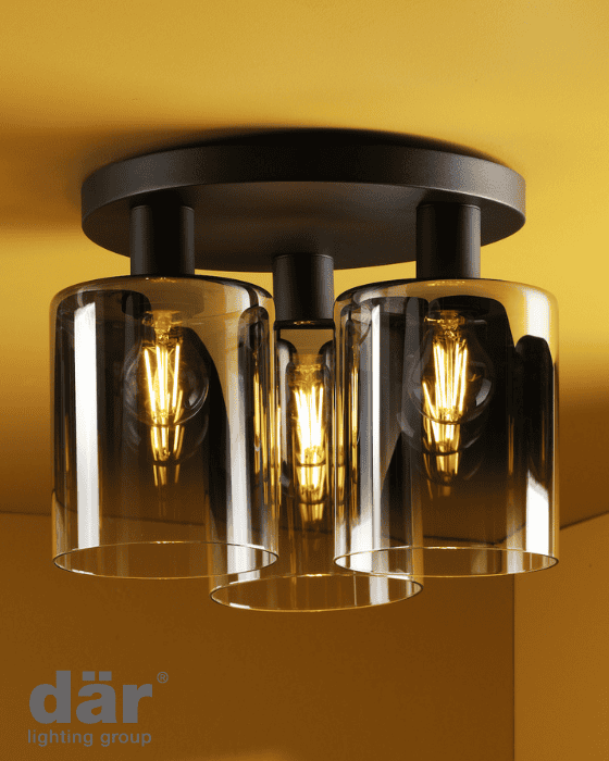 Ceiling light fixture with three glass shades on a yellow background, featuring the dar lighting group logo.