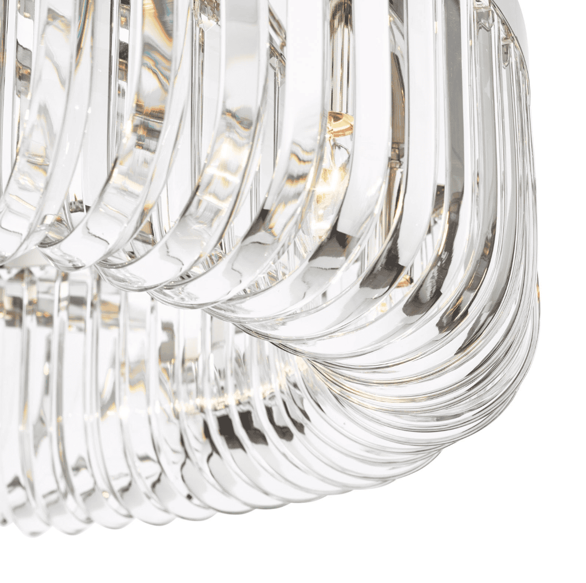 Close-up of a modern dar lighting chandelier with clear glass and a chrome finish.