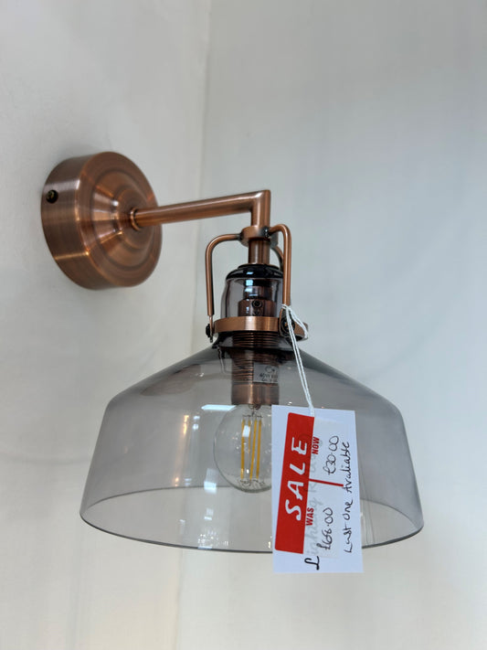 Dar Lighting Copper wall-mounted lamp with a clear glass shade and sale tag on a white background