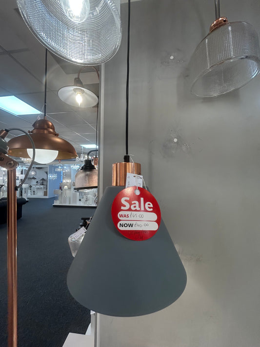 Dar Lighting futuristic lamp with a 'Sale' tag on a reflective surface