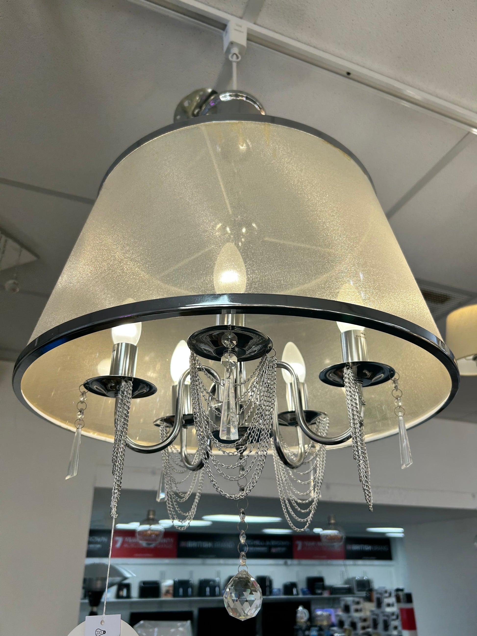 Searchlight decorative wall light fixture with intricate design on a neutral background