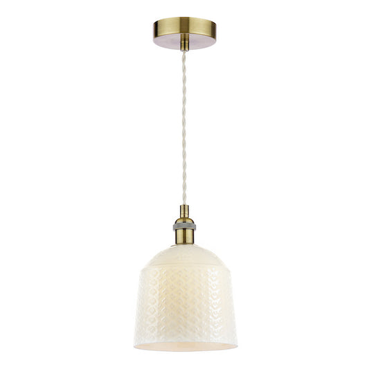 Pendant light with textured cream shade and antique brass fixture on a white background