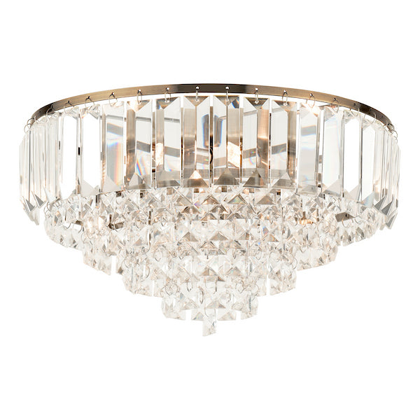 Crystal and antique brass ceiling light on a white background